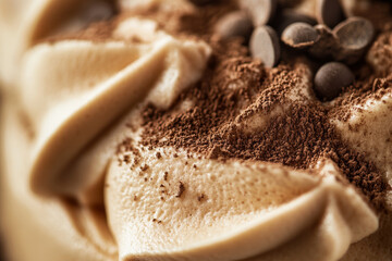 A rich mocha mousse background showcasing frothy textures and chocolate brown layers.