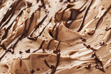 Fototapeta premium A smooth mocha mousse background with layers of warm chocolate and coffee-colored streaks.