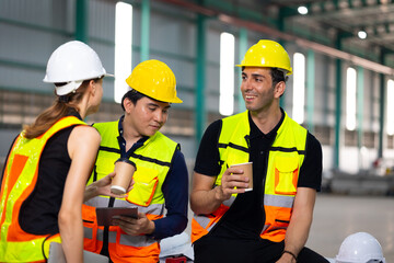 coffee break together in warehous. Ethnic diversity worker people, Success teamwork. Group of professional engineering people wearing hardhat safety helmet meeting