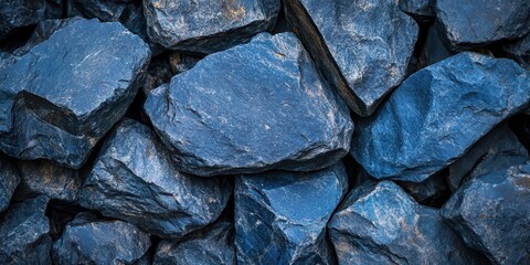 Close-up of dark blue stone with rough textures and natural imperfections.
