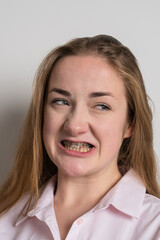 Young woman after dental medical care