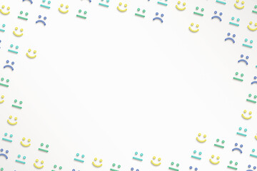 白い背景にカラフルな様々な顔のアイコンが並ぶフレーム