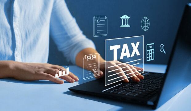 Business person using a laptop to complete income tax return form online.Calculation tax return concept.	
