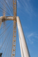 Part of Ferris wheel against the backdrop of a blue sky and the Persian Gulf. Dubai