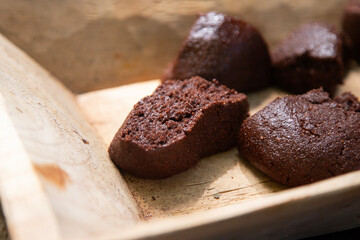 Organic chocolate from the Oaxaca region of Mexico produced in a traditional way on a metate, an...