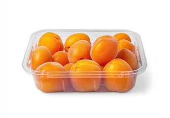 A clear plastic container filled with fresh, ripe apricots.