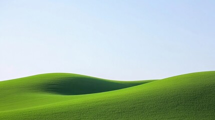 Obraz premium Lush Green Rolling Hills Under Clear Blue Sky in Serene Natural Landscape