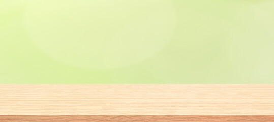 wooden table and green background