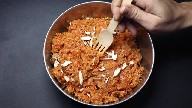 Gajar ka halwa, carrot halwa is a carrot-based sweet dessert pudding from the Indian subcontinent.