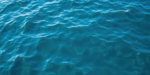 Fototapeta premium Blue water wave texture with a smooth, flowing pattern, abstract, ripple