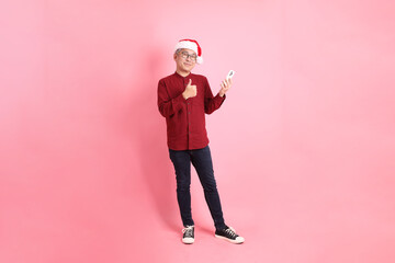 Man wearing Santa hat