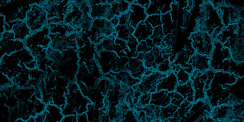 A crack pattern on a black background featuring an abstract lighting theme in cyan color. Abstract background is well-suited for use as wallpaper.