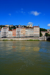 View of colorful buildings on the quay on the Saone River in downtown Lyon, France.