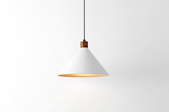 A white lamp with a wooden base hangs from a ceiling