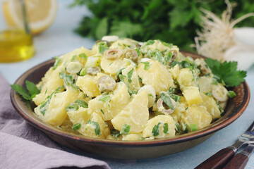 A bowl with Greek potato salads