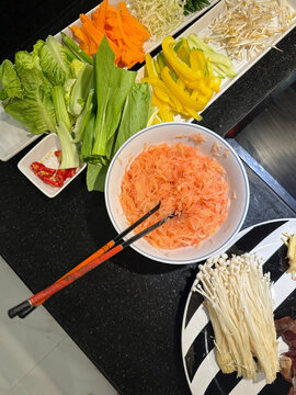 Close-up overhead view of assorted prepared Thai vegetables ready to cook