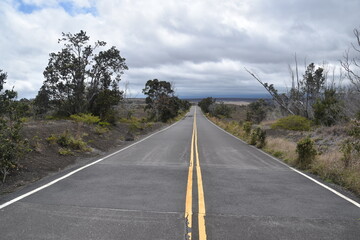 Broken roads and split asphalt from the volcanic eruptions and activities around Hawaii Volcanoes National Park on the big island