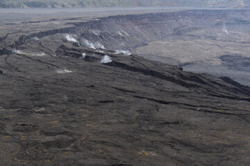 The black coastal landscapes and lava beaches from the active volcanoes on the big island of Hawaii, Pacific