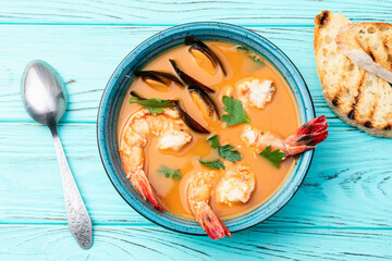 French seafood bouillabaisse soup with shrimps and mussels photography . Top view