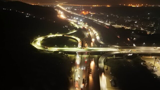 Drone Shot Overpasses Junction at Nighttime