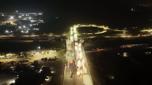 Aerial View of Busy Interchange Highway At Night