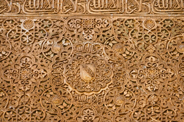 Granada, Spain, Relief carvings on an interior wall of the Alhambra Palace. 