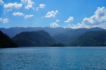 BLED, SLOVENIA -22 JUNE 2024- Landscape view of Lake Bled in summer. Bled is a lake in the Julian Alps of the Upper Carniolan region of northwestern Slovenia with a castle on an island.