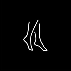Female legs icon  isolated on black background.