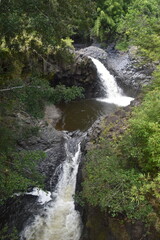 The stunning big wateralls running over the black lava rocks on Maui Island in Hawaii