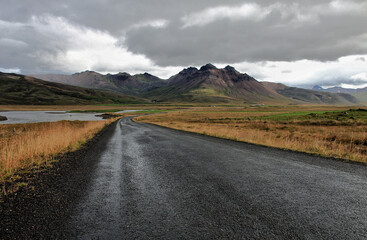Road with mountains in the background. Iceland.