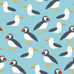 Naklejka premium Puffin and Seagull seamless pattern. Cute Cartoon arctic animals background. Vector Illustration.