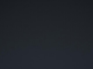 Fototapeta premium Black paper texture with subtle smudges and creases, smudges, dark