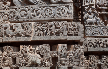 Indian architecture background on traditional style relief, abandoned temple in India.