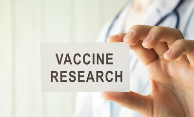 Text Vaccine COVID-19 with on the card. Concept about vaccine of coronavirus or COVID-19.