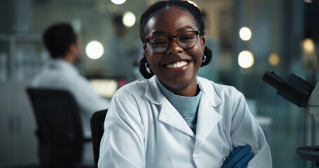 Woman, scientist and lab portrait at night with smile, science research and medical study. Happy,...