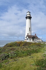 The old historic Pigeon Point Light Station Lighthouse and coastal landscpaes on the Pacific West Coast of California
