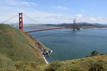 The view over the red Golden Gate Bridge and the San Francisco Skyline in California