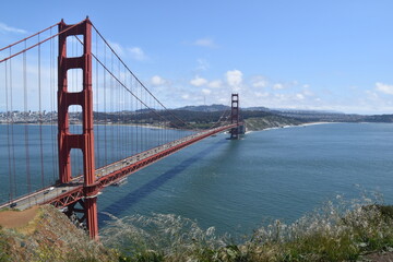 The view over the red Golden Gate Bridge and the San Francisco Skyline in California