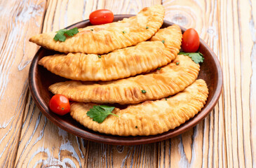 Snack chebureks. Pasties with meat photography . Top view