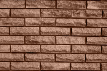textured background of masonry wall in the color of the year 2025 Mocha Mousse. High quality photo
