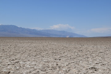 The turquoise azure blue Lake Tahoe and the surrounding mountains and forest 