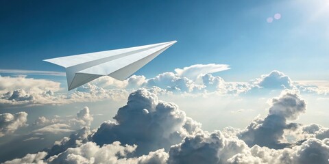 A simple paper airplane soars high above the fluffy clouds in a bright blue sky, symbolizing freedom and the pursuit of dreams.