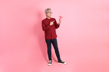 50s Man in red shirt