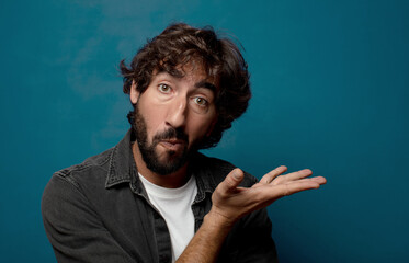 young adult bearded man with a copy space