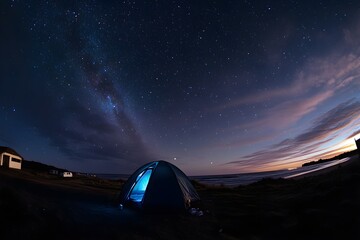 This is an emotional photo of setting up a tent in a large campsite on a dark night, lighting a lantern, the beautiful Milky Way stretching out in the sky, and the stars twinkling.