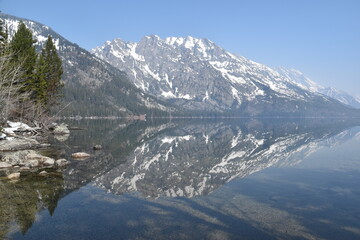 Fototapeta premium Beautiful landscapes covered in thick smoke from forest fires at Grand Teton National Park, Wyoming