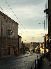 Main  street of a typical city
with houses and a road looking down. Grungy urban background. Architecture and landmarks. 