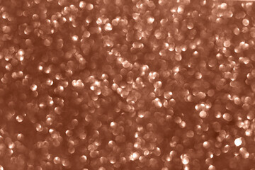 Mocha brown sequins background. Perfect texture for your design. Demonstrating color of 2025 year