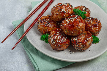 Tsukune, Japanese meatballs, minced chicken, fried on a skewer, with yakitori sauce, homemade, no people,