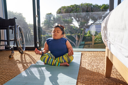 Woman with osteogenesis imperfecta meditating